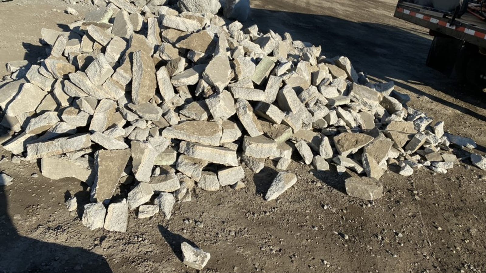 Broken concrete and masonry rubble stacked for heavy debris removal in Largo, FL