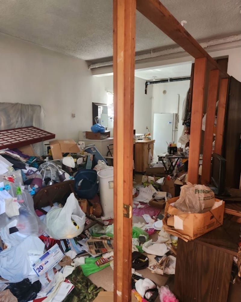 Junk removal crew clearing a load in Imperial Point, Largo, FL
