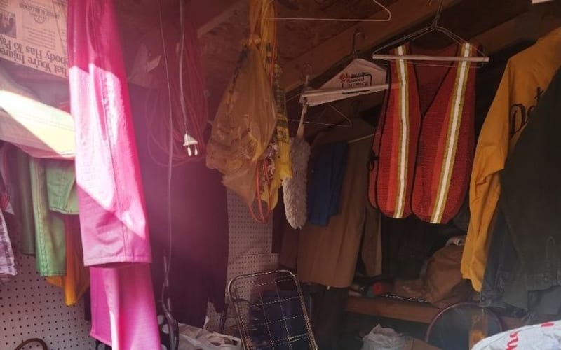 Closet packed with clothing, bags and household goods during a Largo, FL estate clearance